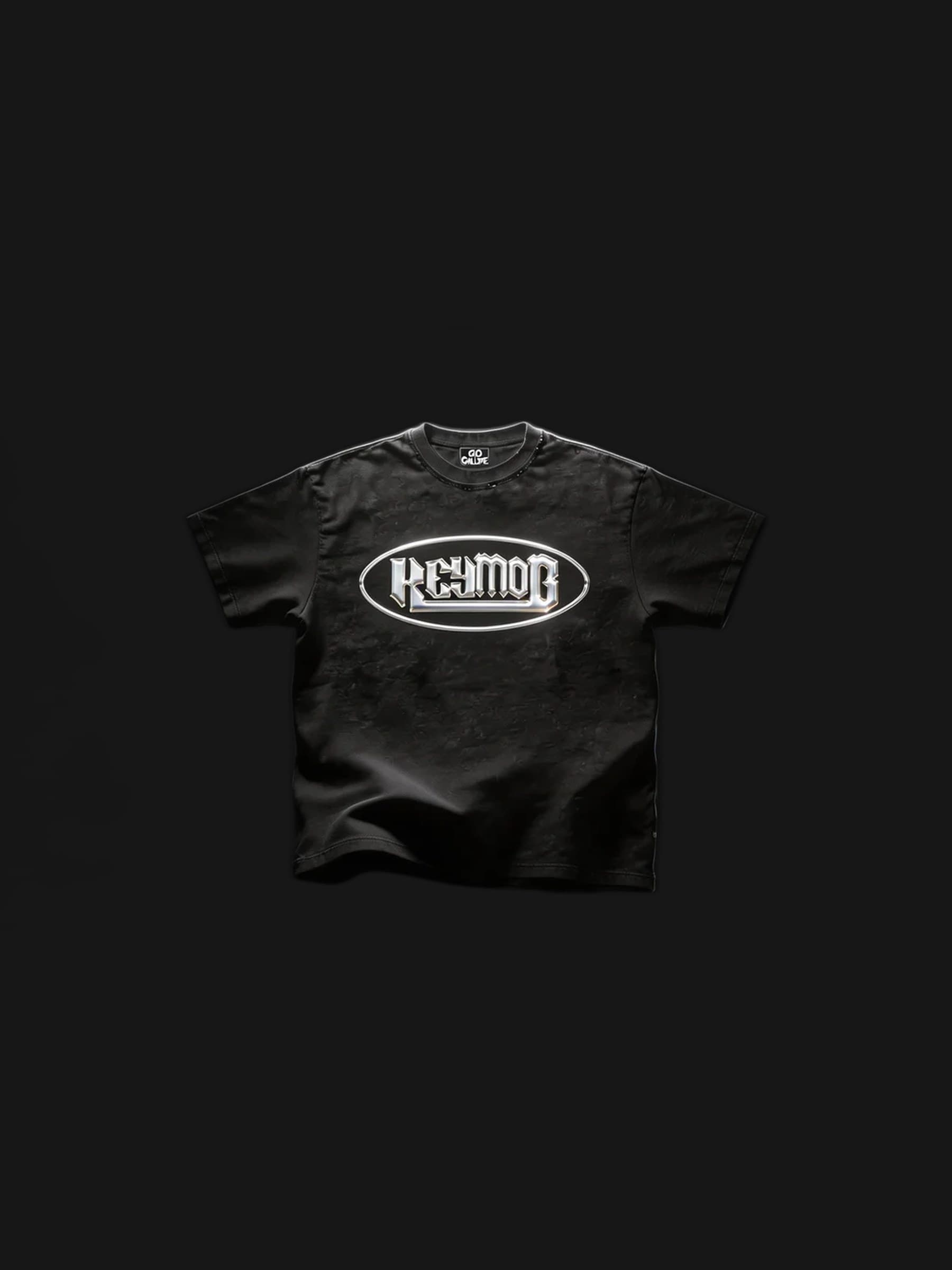 Black t-shirt with the chrome KEYMOB oval badge on the chest