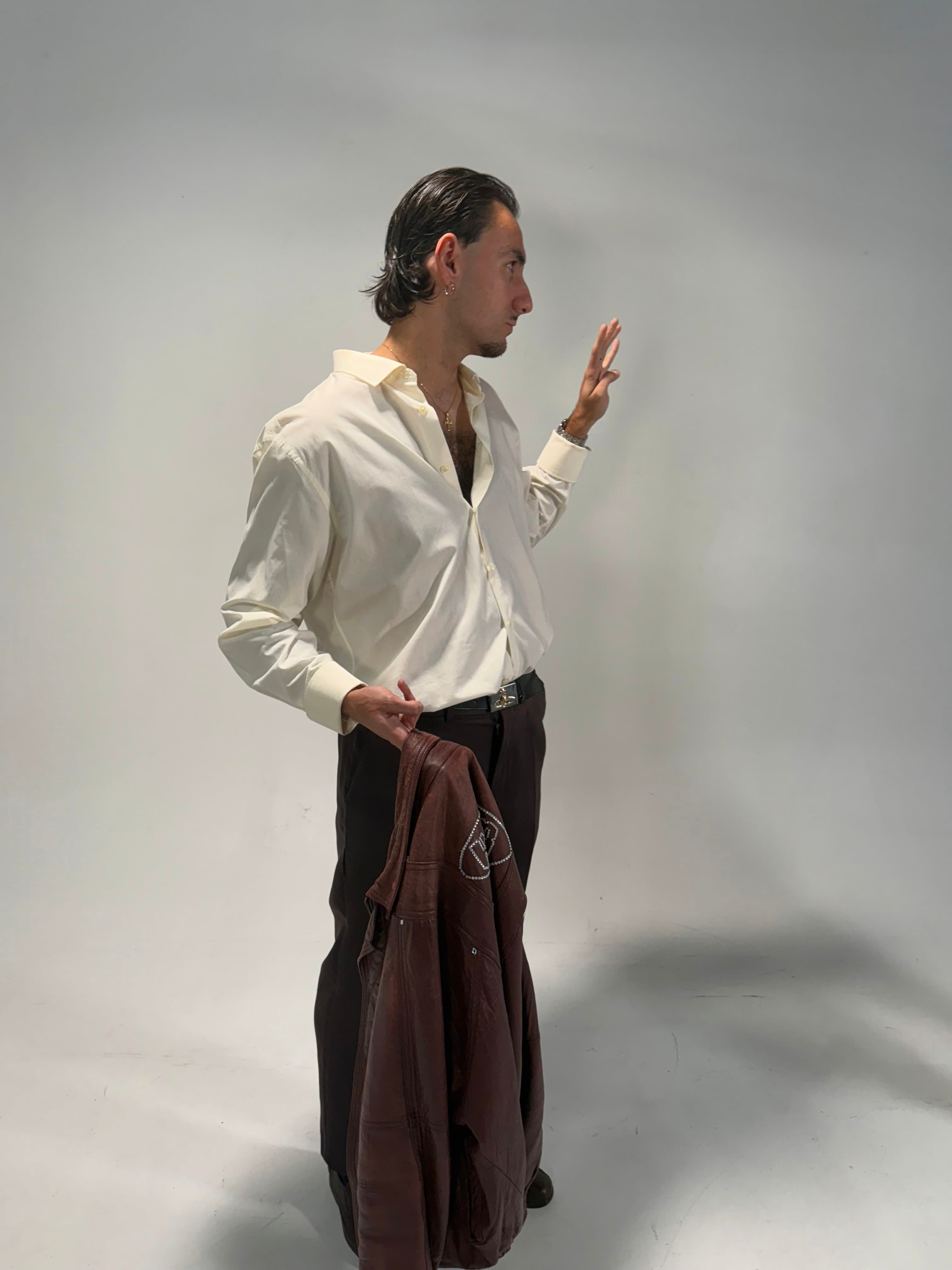 Gio Galore styling for Uve Key: white shirt, dark trousers, burgundy jacket in hand